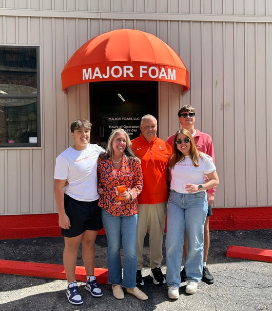 The Major Foam team outside the shop’s orange awning